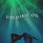 cover: A Traci - Holding On